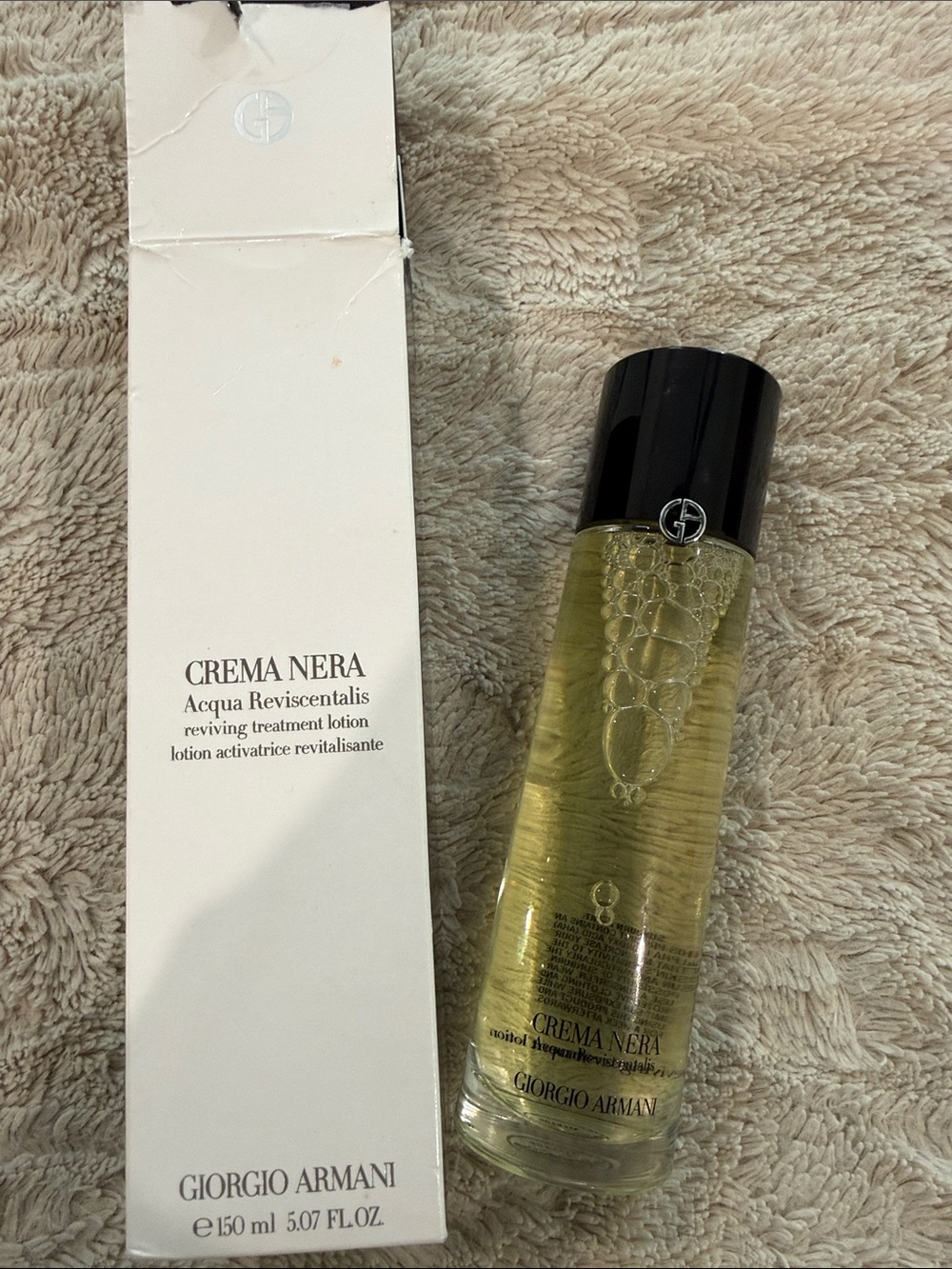 Giorgio Armani Crema Nera Reviving Treatment Lotion โ Clear Yellow & Black